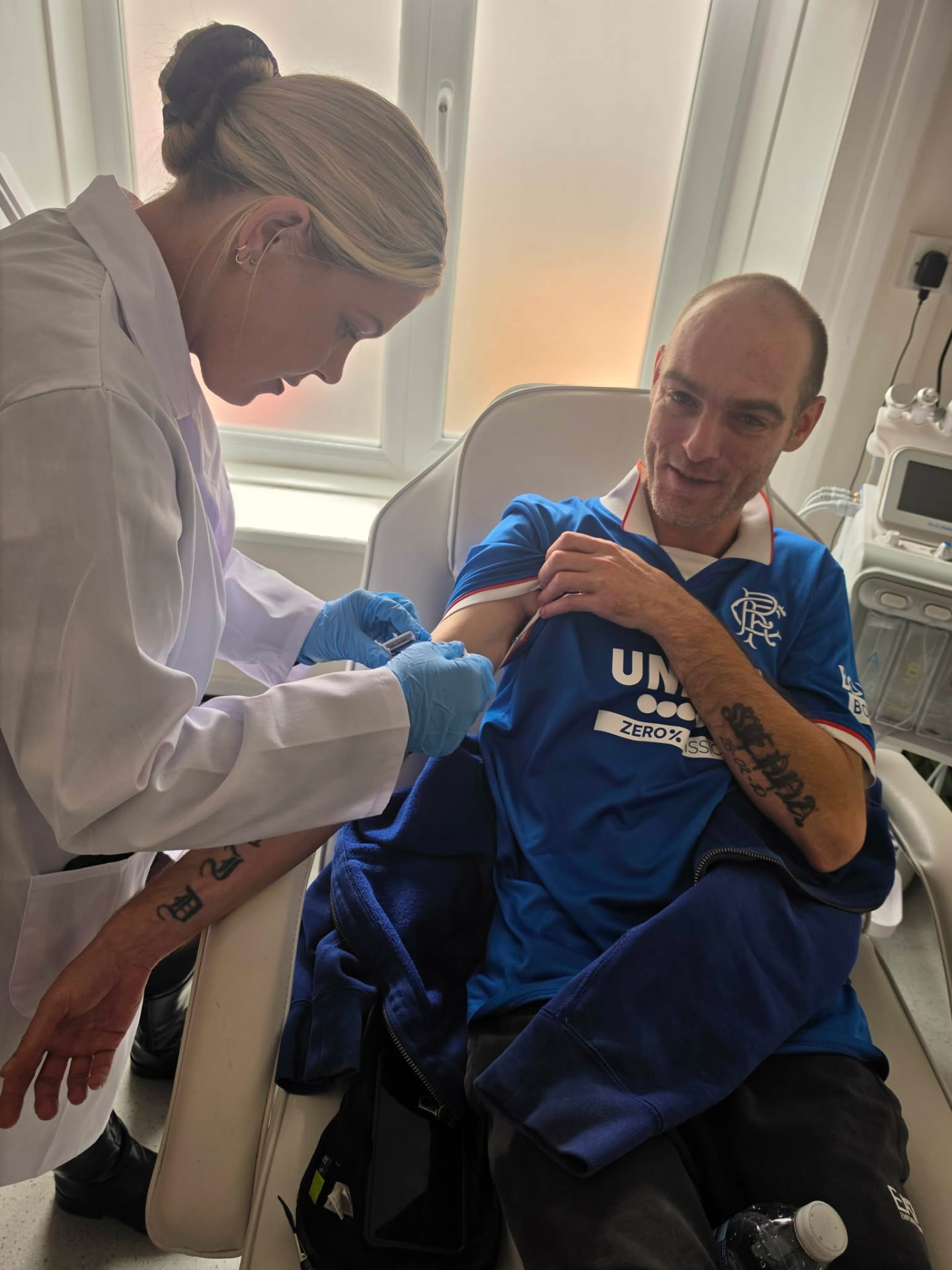 Practitioner with a client in the private treatment room at the Hereford clinic
